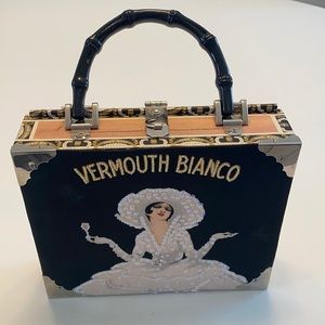 Vermouth Bianca vintage cigar purse. Great condition.